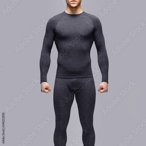 Crop man in thermal underwear