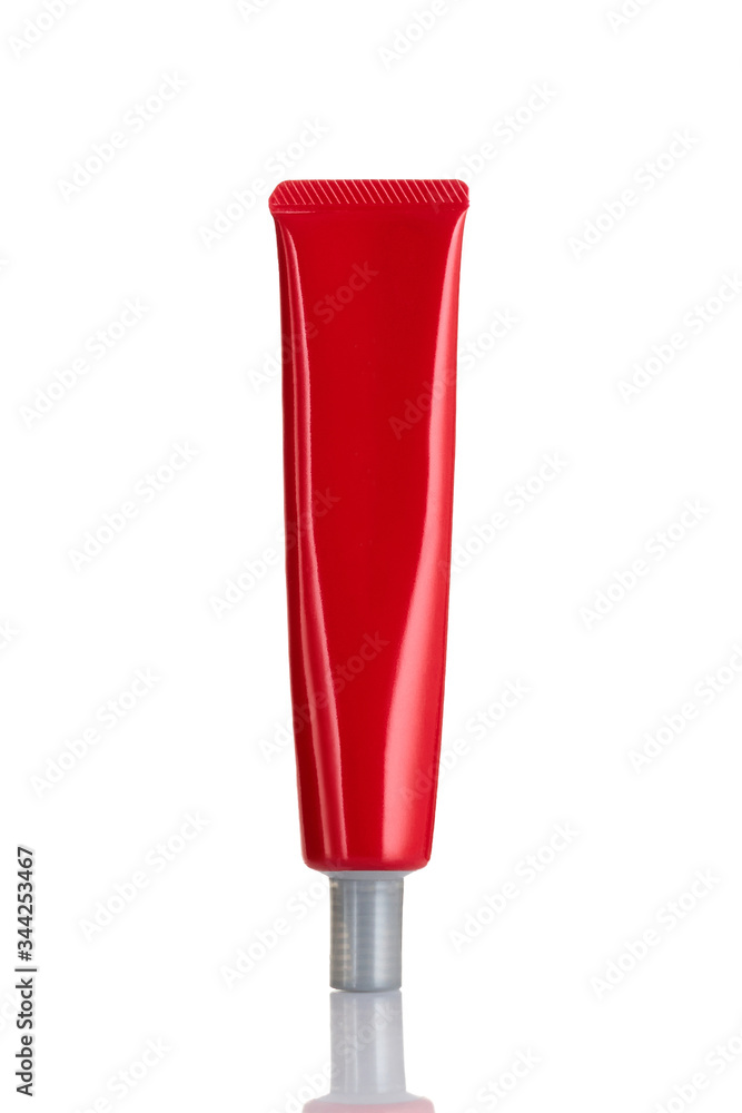cosmetic mock up tube isolated on white background. Empty, clean red plastic SPA cosmetic products of cream or gel cosmetic mock up tube isolated on white background. Empty, clean red plastic SPA cosmetic products of cream or gel