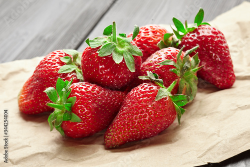 ripe strawberries on a old wooden table