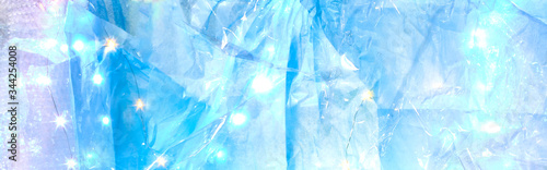 Lights behind crinkled blue tissue paper