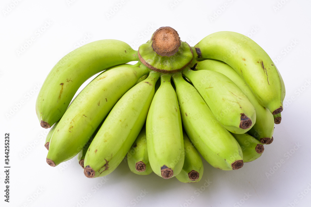 Portrait Of Green Bananas Against White Background