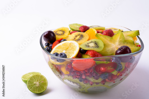 Portrait Of Assorted Delicious Fruits Against White Background