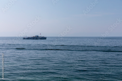 Lake Baikal, cruise ship rides tourists on a Sunny day © Андрей Сидоров