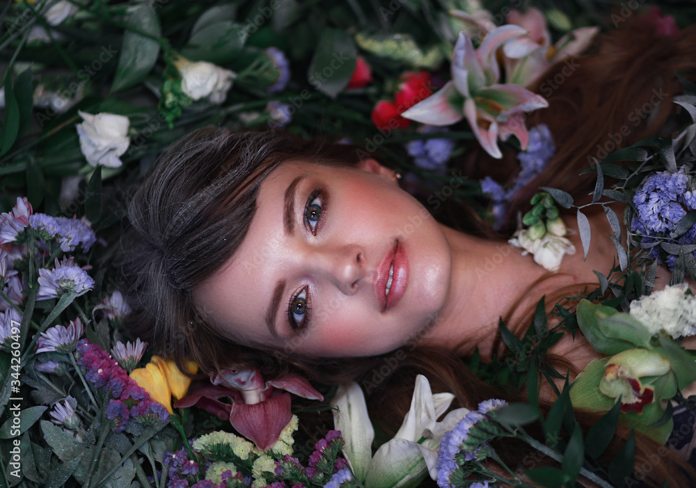 Fototapeta premium beautiful girl with flowers spring mood