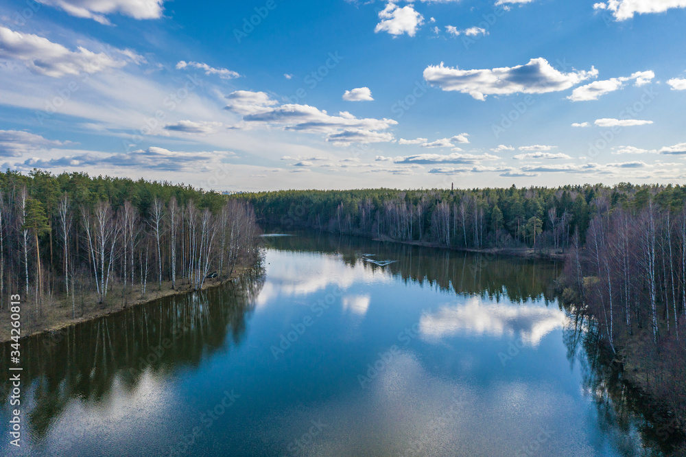 Fototapeta premium The Kharinka River in the city of Ivanovo on a spring cloudy day.