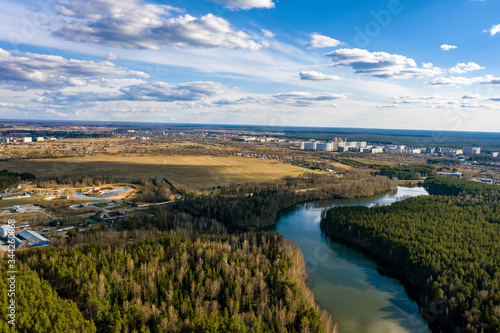 A panorama of the city of Ivanovo with the Kharinka River from a bird's eye view.
