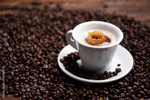 Drops of coffee splashing in a coffe milk, high speed
