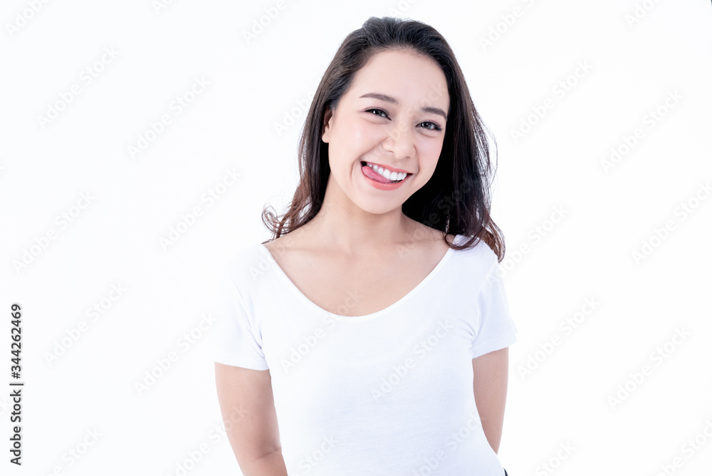 Portrait images of Asian young, pretty woman, She is smiling brightly, She has beautiful white and clean teeth, sparking eyes On white background to people and beauty concept. Portrait images of Asian young, pretty woman, She is smiling brightly, She has beautiful white and clean teeth, sparking eyes On white background to people and beauty concept.