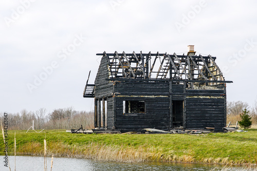 burnt down two storey wooden house in rural area