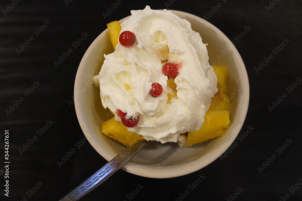 Pineapple with whipped cream and Silver buffaloberries Pineapple with whipped cream and Silver buffaloberries