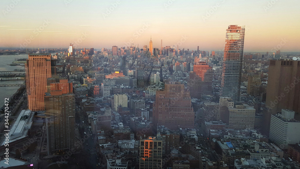 High Angle View Of Cityscape Against Sky During Sunset