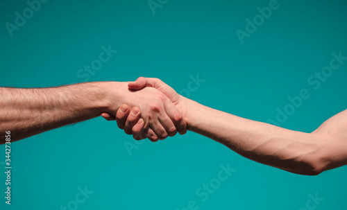 Handshake between two businessmen. Hands concept. Sky background. Hand. 