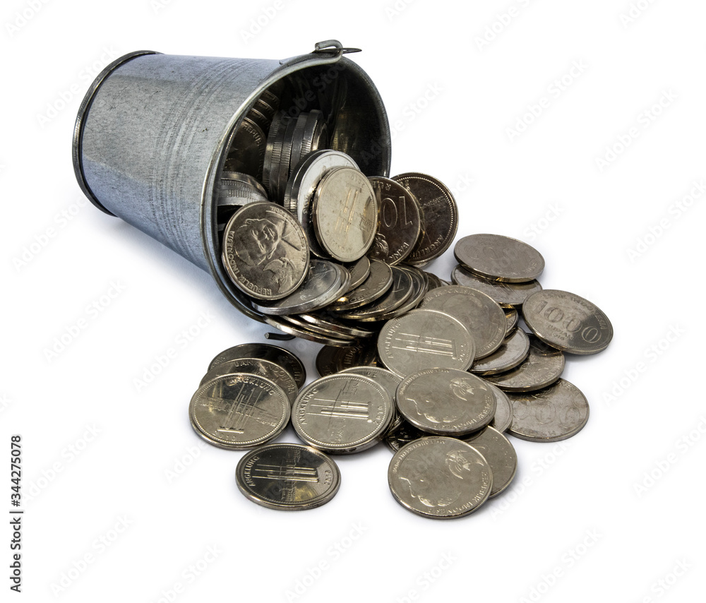 coins spilling from metal bucket, Investment concept and savings isolated on white background coins spilling from metal bucket, Investment concept and savings isolated on white background