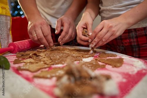family prepares cookies for the holiday
