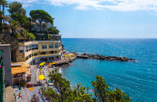 Bogliasco, Italy - August 19, 2019: Famous summer beach on Ligurian seashore in Bogliasco near Genoa, Liguria, Italy