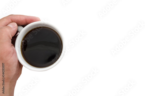 cup of coffee in hand on a white background. Copy space