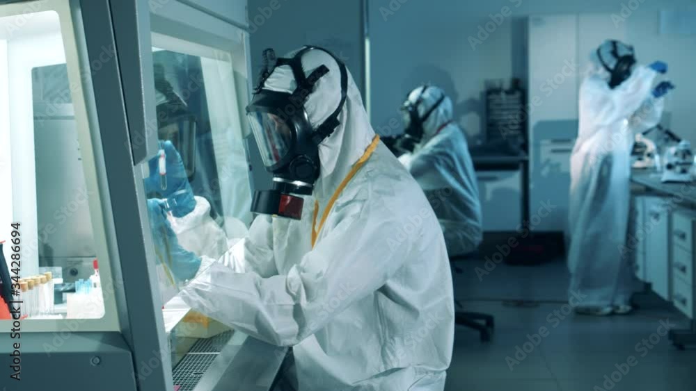 Medical research of antibodies to COVID-19. Scientific workers are doing analysis of biological samples Medical research of antibodies to COVID-19. Scientific workers are doing analysis of biological samples