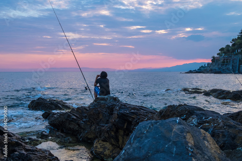 Fisherman in twilight