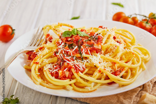 Tasty appetizing classic Italian spaghetti pasta with tomato sauce
