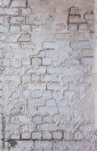 Obraz na płótnie Wall with silicate brick aged with crashed plaster