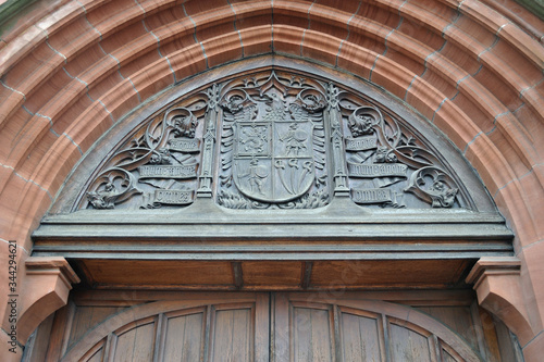 Heraldic Carving above Arched Stone Doorway  of Church Building 