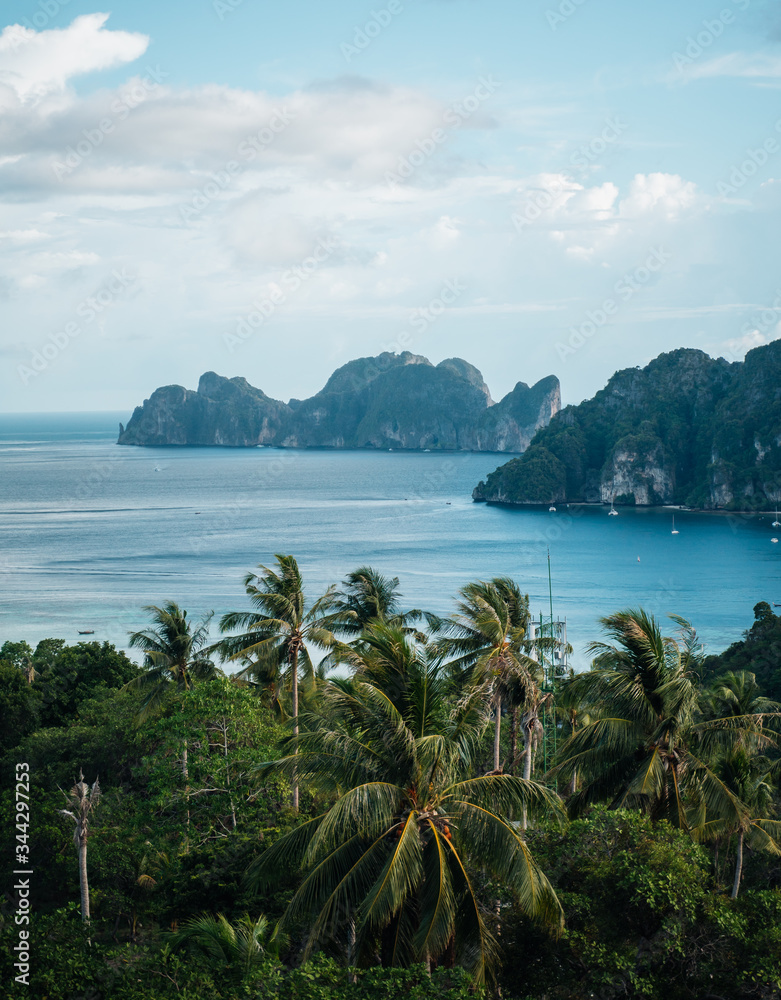 Beautiful tropical island of Koh Phi Phi, Thailand with blue water and green rocky formations