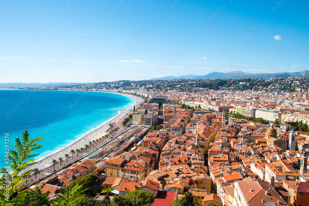 Obraz premium Aerial view of Coast of Nice and French Riviera with turquoise waters on a sunny day
