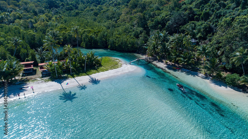 Island Thailand beach drone view of palm tree shadows on beach © Matt