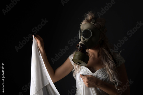Woman in Wedding Dress and Gas Mask