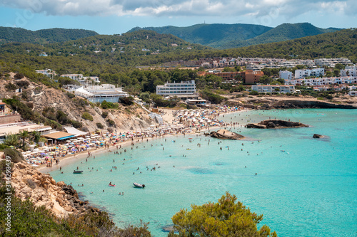 Mediterranean Sea beach at Ibiza island, stunning seaside scenery of Cala Tarida, Spain Balearic Islands. photo