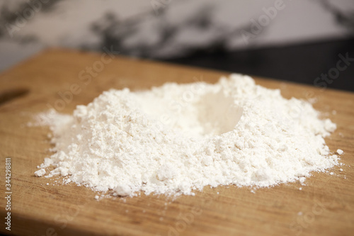 Flour on a wooden board