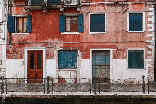 Typical Venice architecture facade worn out by time © tavi004