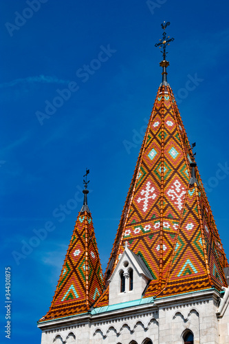 Tiled roof of Matthias Church on the hill in Budapest, Hungary. photo