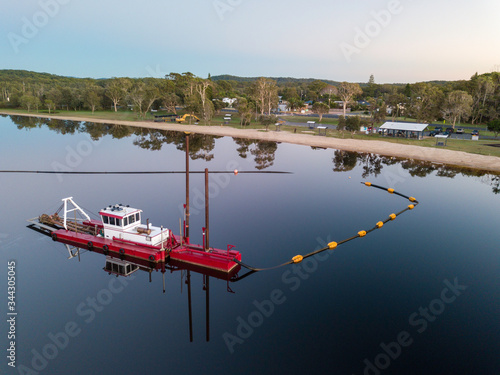 Dredging Lake Cathie NSW Australia photo