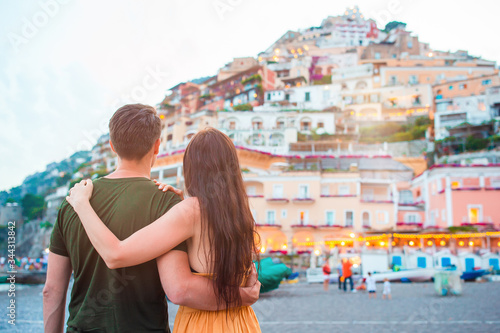 Obraz na płótnie Summer holiday in Italy. Young couple in Positano village on the background, Amalfi Coast, Italy w salonie