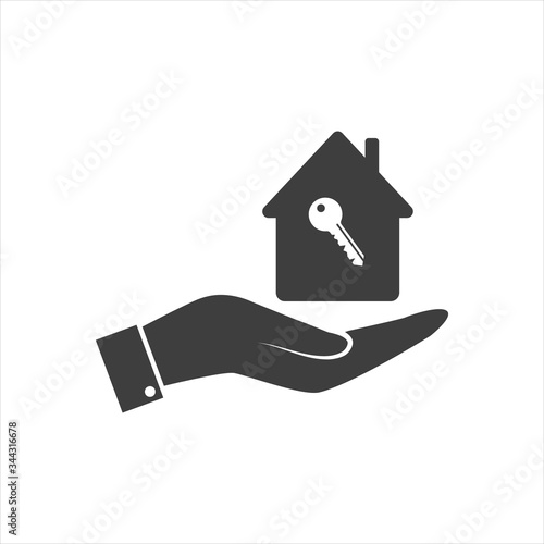 Human hand with a house icon on a white background.