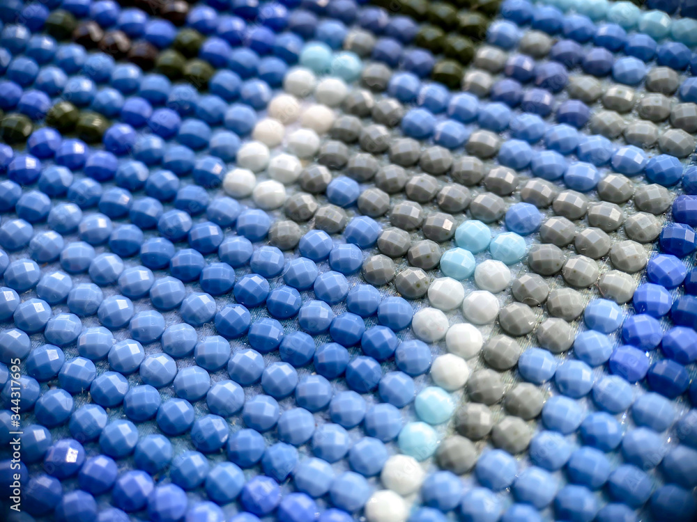 Fototapeta premium Close-up, colorful round diamond embroidery bright. Hobbies and entertainment.