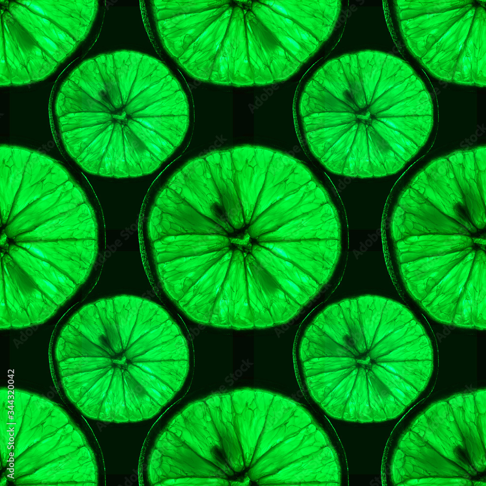 seamless pattern of slices of green citrus fruit with backlight isolated on black background, can be tiled seamless pattern of slices of green citrus fruit with backlight isolated on black background, can be tiled