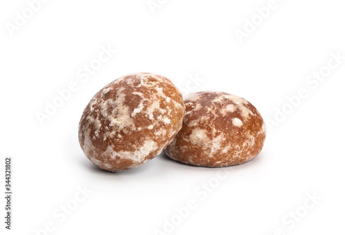 Gingerbread cookies with jam on a white background.