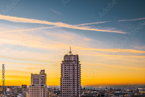 Impressive sunrise on the Madrid skyline, vivid colors, dramatic sky. Downtown landscape with views from the top of a building