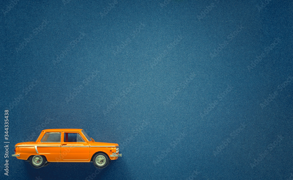 Orange car model on a blue background for the site. Zaporozhets 968-A, ZAZ Orange car model on a blue background for the site. Zaporozhets 968-A, ZAZ