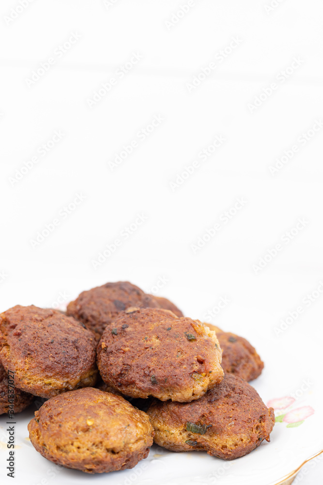 Fried meatballs served on the plate with copy space Fried meatballs served on the plate with copy space