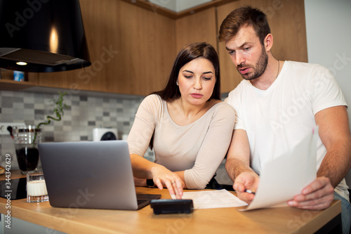 Couple calculating their domestic bills