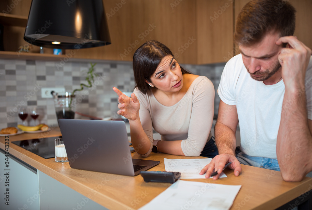 Woman and man paying taxes online