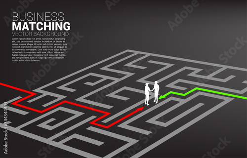 Silhouette of businessman handshake in the maze. Concept of business matching. Team work partnership and cooperation.