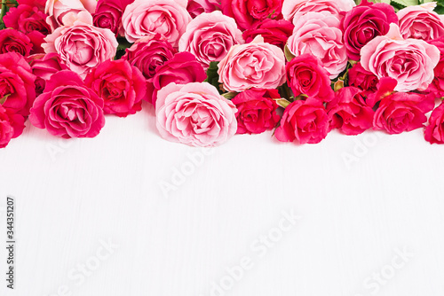 Pink roses bouquet on white background. Mothers day  Valentines Day  Birthday celebration concept. Greeting card. Copy space
