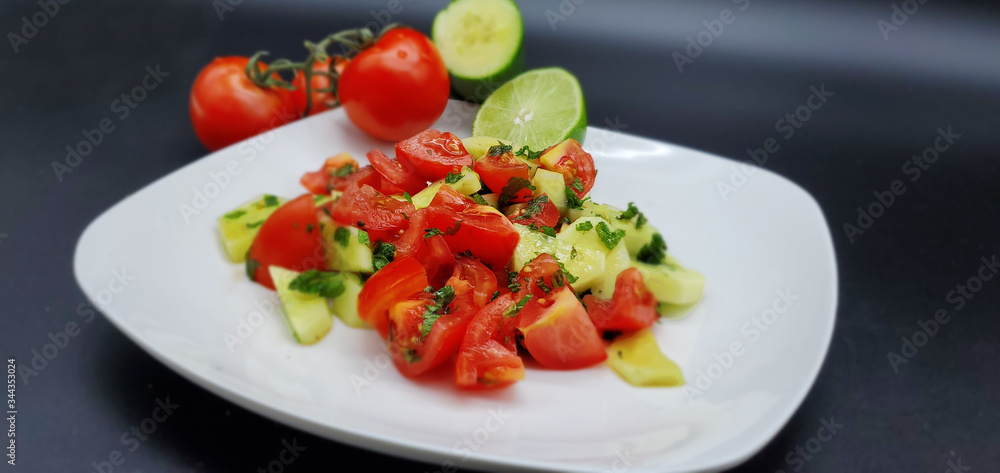 Cucumber Salad with tomato and mint.