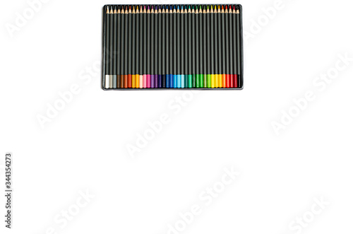 Colored pencils in a case on a white background.