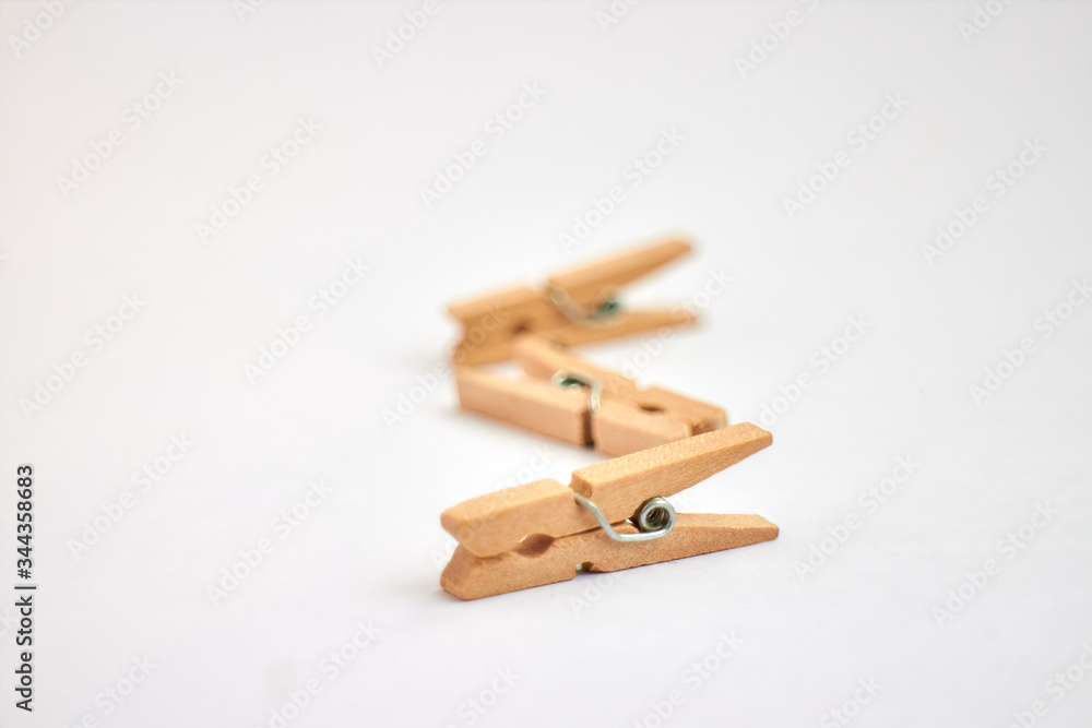 wooden clothespins on white background wooden clothespins on white background