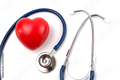 Stethoscope and red heart for check health isolate on white